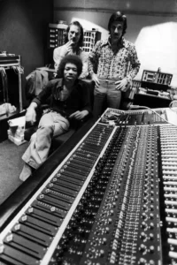 Jimi Hendrix with Eddie Kramer and Jim Marron.